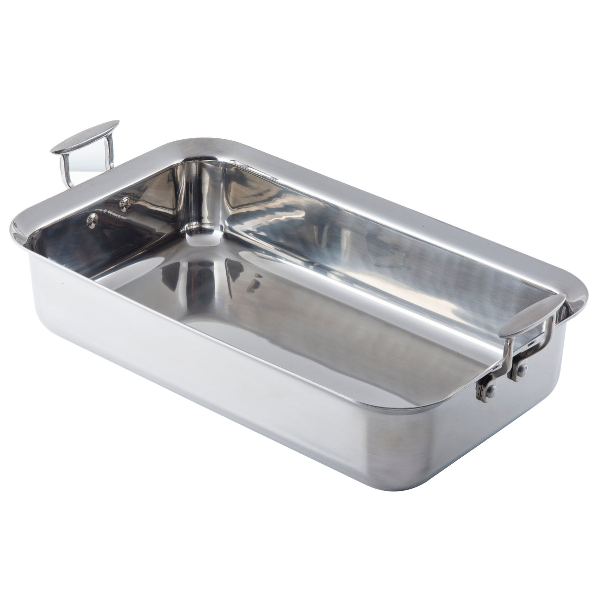 A rectangular Tri-Ply Serving Pan with two sturdy handles on each short end. This stainless steel serving pan features a shiny, reflective surface and straight sides, perfect for roasting meat or vegetables. The interior is smooth and uncoated.