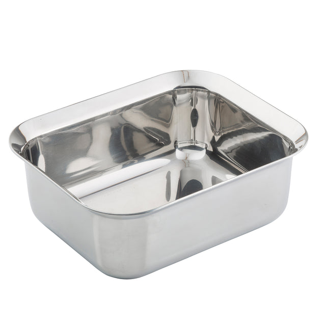 A shiny, rectangular Tri-Ply Serving Pan with rounded corners and slightly flared edges is shown empty against a white background. Made of stainless steel, its reflective surface appears deep and is suitable for roasting or baking on induction cooktops.
