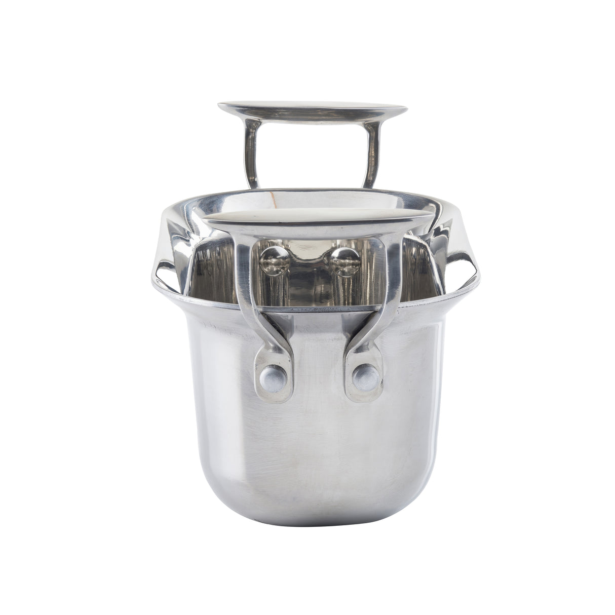 A shiny Tri-Ply Serving Pan with a matching lid and sturdy handles stands upright on a white background. Its modern, reflective stainless steel design is compatible with induction cooktops. The lid is placed upside down, handle clearly visible.