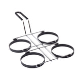 A metal kitchen tool with four non-stick egg rings on a chrome frame and a black handle. The rings, arranged in a two-by-two grid, keep eggs or pancakes in shape. The elongated handle ensures safe handling, and the egg ring set is dishwasher safe for easy cleaning.