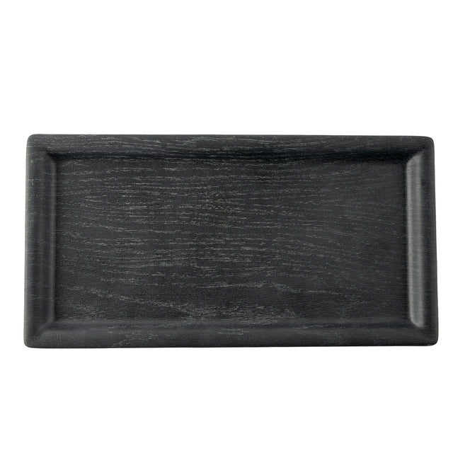 A rectangular black tray, such as the TableCraft 12457 Onyx Melamine Serving Tray, features a subtle wood grain texture, raised edges, and a smooth matte finish. The empty tray is photographed from above against a white background.