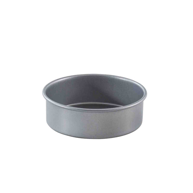 A non-stick, round silver-colored metal cake pan with straight sides and a flat base is shown on a white background. The pan appears clean and empty, perfect for baking cakes or other round pastries.