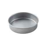 A plain, round steel cake pan with straight sides and a flat base is shown on a white background. The pan has a smooth, shiny, non-stick surface and no handles or markings.