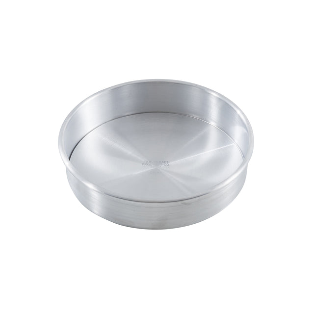 A round, shallow cheesecake pan with straight sides and a flat base. The smooth, shiny metallic surface of this TableCraft pan is empty and positioned against a plain white background.