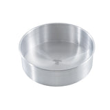 A round, deep, silver-colored TableCraft 12468 cheesecake pan features straight sides and a smooth interior surface. The bottom center is stamped with manufacturer information. The round aluminum pan is shown on a white background.