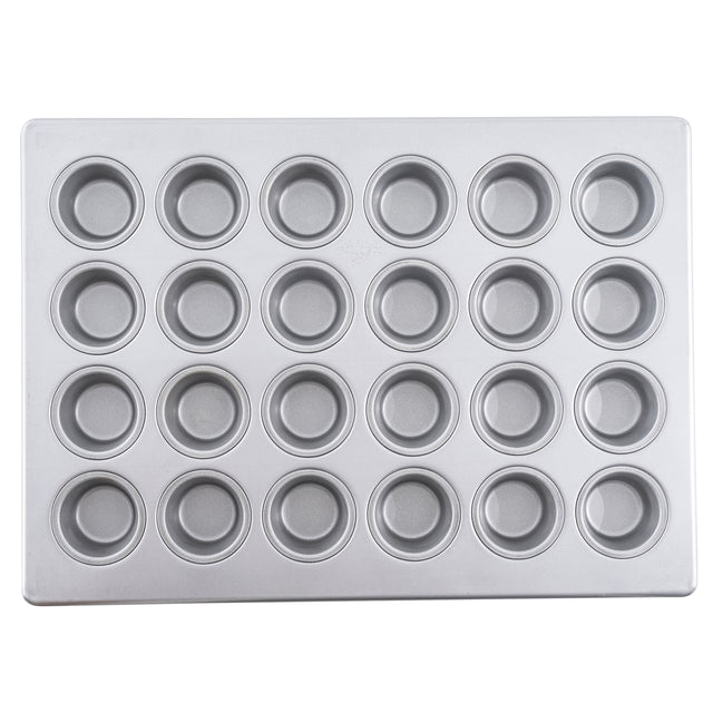 A silver silicone glazed non-stick mini muffin pan with 24 evenly spaced, round cups arranged in a 4 by 6 grid. The smooth, shiny surface and slightly raised edges make it perfect for baking small cupcakes or muffins.