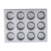 A clean, silver muffin pan with a non-stick surface, featuring twelve round cups in a 3 by 4 grid. The pan is empty and viewed from above against a white background.