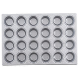 A rectangular non-stick cupcake pan with 24 round cups arranged in a 4 by 6 grid, viewed from above on a white background. The muffin pan is empty and clean.