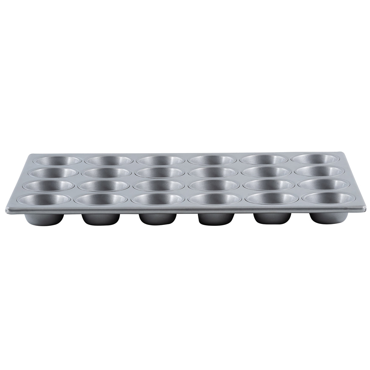 A silver non-stick muffin pan is shown from the side. It has four rows of six round muffin cups each, making a total of twenty-four cups. The pan’s shiny surface and evenly spaced cups are clearly visible against a plain white background.