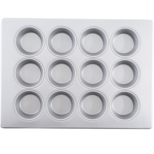 A silicone glazed non-stick Large Muffin Pan featuring 12 cups in a 3 by 4 grid, perfect for baking cupcakes or muffins. The clean, silver pan is shown empty from a top-down view on a white background.