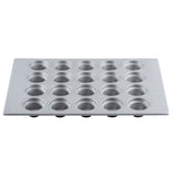 A large crown muffin pan with 24 evenly spaced, round cups arranged in a 4 by 6 grid is shown from a slightly angled perspective against a white background. The silicone glazed non-stick tray is clean and empty.