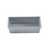 A rectangular, silver Aluminized Steel Bread Pan with straight sides and a flat base, photographed from a slightly elevated front angle on a plain white background. The pan appears empty and clean, suitable for baking bread or cakes.