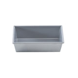 A rectangular, metallic aluminized steel bread pan with straight sides and a flat bottom, shown empty against a plain white background. The pan appears clean and is designed for baking bread or cakes.