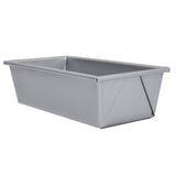 A rectangular aluminized steel bread pan with straight sides and slightly rounded edges, shown at an angle against a white background; the pan has a smooth, reflective silver surface and reinforced rim.
