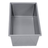 A rectangular, silver aluminized steel bread pan with straight sides and sharp corners, viewed from above at a slight angle. The pan is clean, empty, and has a smooth, reflective surface.