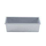 A rectangular loaf bread pan made of aluminized steel with a non-stick coating, featuring straight sides and rounded edges. Shown empty and clean from a front angle against a plain white background, it’s ideal for baking bread or cakes.