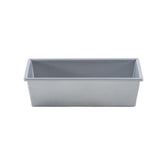 A rectangular, silver aluminized steel loaf bread pan with straight sides and slightly rounded corners, shown from a front angle on a plain white background. The empty pan features a non-stick coating, ideal for baking bread, cakes, or meatloaf.