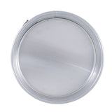 A round, closed, silver metal lid—resembling one from a springform pan—is viewed from above against a white background. The smooth, shiny surface reflects light and is bordered by a raised rim. The image is centered and evenly lit with no visible text.
