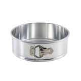 A 9.5 inch springform pan with smooth sides, a detachable base, and a latch for easy release is shown against a white background. The shiny, reflective aluminum springform pan features sleek interior and exterior finishes.