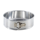 A shiny, round aluminum springform pan with high sides and a durable latch for easy release, shown empty against a plain white background.