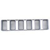 A silver non-stick bread pan with six connected rectangular loaf molds arranged in a single row, viewed from above. Each mold has straight sides and rounded corners, separated by metal dividers within a long rectangular frame.