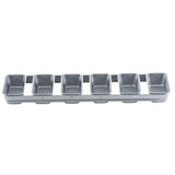 A silver non-stick bread pan features six rectangular compartments in a single row, each with straight sides and rounded corners. The clean, empty tray is photographed on a white background.
