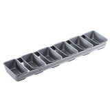 A long, silver non-stick bread pan with eight evenly spaced, rectangular loaf molds joined together in a single row, viewed from a slight angle on a white background.