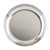 A round, shiny stainless steel plate, similar to a TableCraft 12511 seafood tower replacement bowl, is photographed from above. Its smooth, reflective surface and slightly raised rim stand out against the plain white background, highlighting its metallic finish.