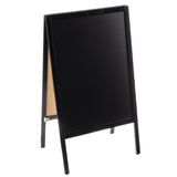 A blank, black chalkboard A-frame stand with a wooden frame sits at a slight angle on a white background. This freestanding floor board sign is empty and ready for custom writing or drawing.
