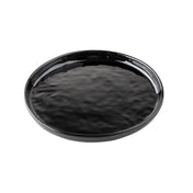 A round, black ceramic serving plate with a slightly raised edge and a glossy, textured surface is shown on a white background. The plate appears empty and has a simple, minimalist design ideal for modern table settings.