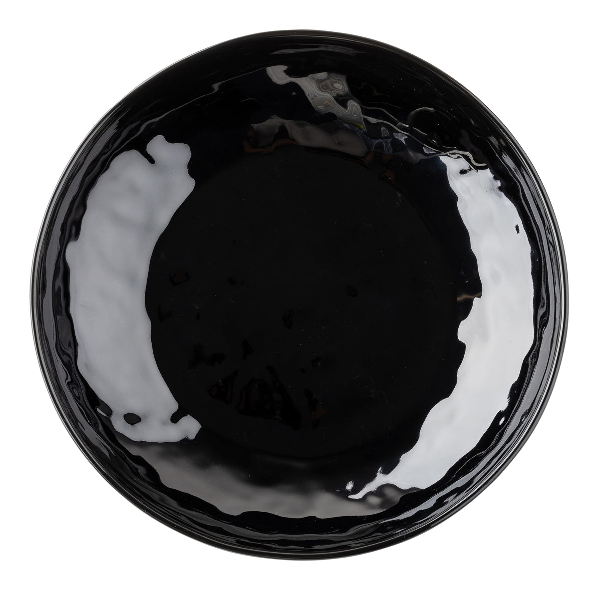 A round, glossy black TableCraft plate seen from above. The melamine surface has subtle reflections and wavy edges, giving it a slightly irregular, hand-crafted appearance. The plate is empty and isolated on a white background.