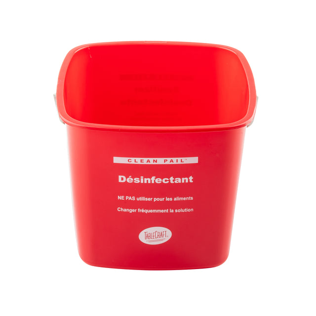 A bright red HDPE cleaning pail labeled “Désinfectant” in white French text, advising not to use for food and to change sanitizer solution frequently, with the TableCraft logo below; the pail is clean, empty, and photographed on a white background.