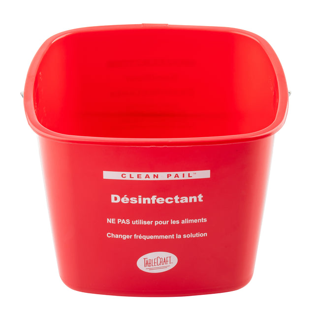 A red HDPE cleaning pail with CLEAN PAIL and Désinfectant in white, plus French instructions not for food use and to change the sanitizer frequently. TableCraft branding appears near the bottom. The empty pail is shown on a white background.