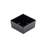 A small, empty, black Simple Solutions Bowl with slightly rounded corners is shown on a white background. Crafted from durable melamine, this TableCraft dish features smooth surfaces and a modern, minimalist design.