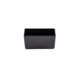 A small, rectangular black ceramic container with smooth sides and a glossy finish, similar to a Simple Solutions Bowl by TableCraft, is photographed against a plain white background. The empty container has slightly rounded edges and an open top.