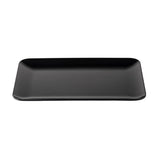 A rectangular, matte black Sierra Collection serving platter with slightly rounded corners and a gentle curve at the edges, photographed against a white background. The empty melamine platter features a smooth, minimalist design.