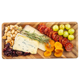 A rectangular acacia serving plate with blue cheese, white cheese, sliced chorizo, green grapes, dried apricots, roasted almonds, cranberries, and rosemary garnish—all neatly arranged on a white background for a standout presentation.