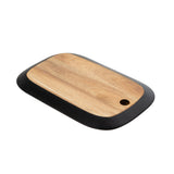 A rectangular serving board with rounded edges, featuring a natural wood grain center and a black border. Part of the TableCraft Acacia Collection, it has a small circular hole in one corner for hanging and is photographed on a white background.