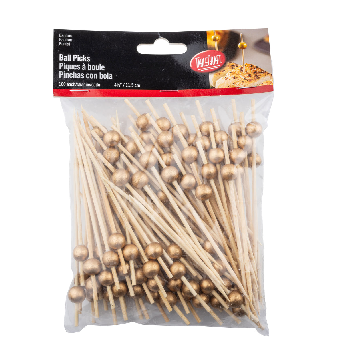 A clear plastic bag labeled Ball Picks contains 100 TableCraft 12583 bamboo ball picks, each topped with a small gold ball. The picks are 4.5 inches (11.5 cm) long, and the package features details in English, French, and Spanish.