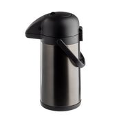 A stainless steel airpot with a black plastic lid, spout, handle, and base. This modern, cylindrical airpot is vacuum insulated to keep beverages hot or cold, and dispenses coffee by pressing down on the top. Handle is positioned upright for easy carrying.