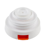 A white, round plastic bottle cap with layered rings and a small central hole. An orange rectangular push tab at the base suggests it’s a flip-top TableCraft 12670 Decaf Lid, ideal as a coffee carafe lid. The background is plain white.