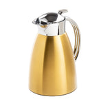 A gold-colored stainless steel coffee carafe with a matte finish, featuring a shiny silver lid and curved handle. The lid has a lever for pouring. This TableCraft carafe is set against a plain white background.