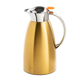 A modern, sleek 68 oz coffee carafe in gold-colored stainless steel features a shiny silver lid and spout, an orange thumb lever, and a curved handle. The stylish carafe stands out against a white background.