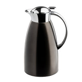 A shiny stainless steel coffee carafe by TableCraft with a black matte body and polished silver lid and handle. The carafe features a sleek, modern design and curved spout for pouring, set against a plain white background.