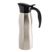 A stainless steel thermal carafe with a curved body, black plastic spout, and handle. Perfect as a TableCraft coffee creamer server, its lid features a top lever for pouring. The carafe is shown against a plain white background.