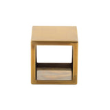 A small, square, gold-colored Barclay Riser Set side table with a minimalist, open design. With a smooth, reflective finish and an open shelf beneath the flat top, it exudes modern appeal—perfect as a stylish stainless steel riser for any space.