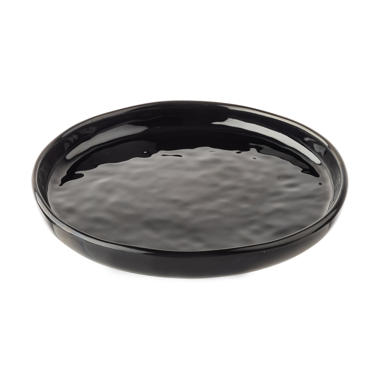 A glossy, round black Serving Plate with slightly raised edges and a subtly textured, wavy surface. Part of the Ridge Collection, this ceramic plate is empty and photographed on a plain white background.