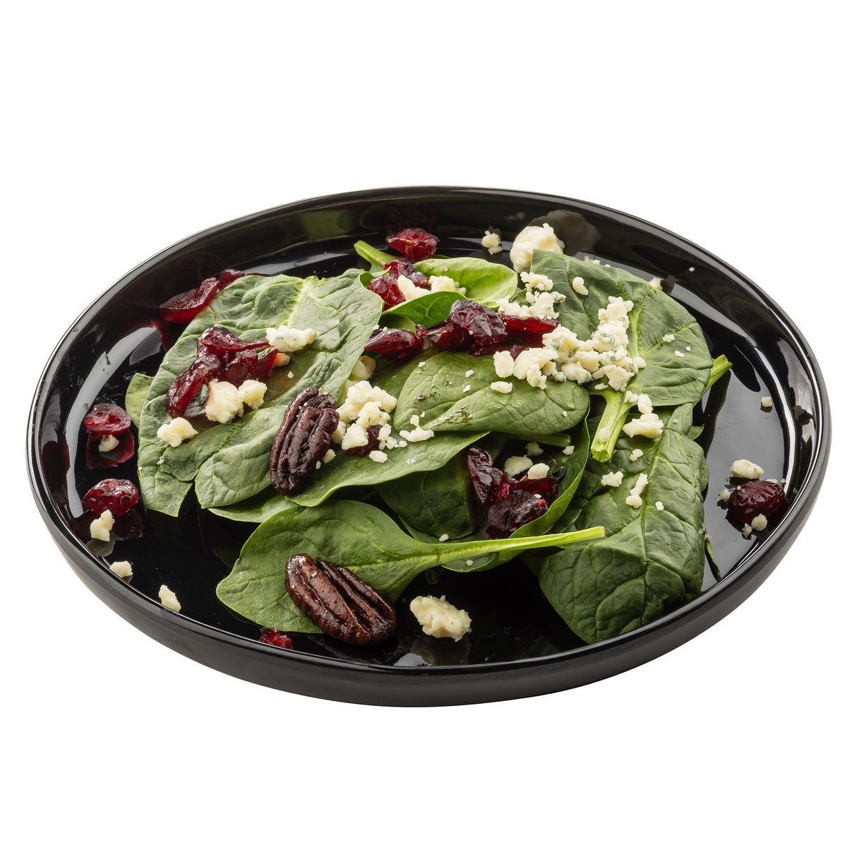 A black Melamine Serving Plate from the Ridge Collection holds fresh spinach leaves topped with crumbled feta cheese, dried cranberries, and whole pecans, all arranged neatly against a white background.