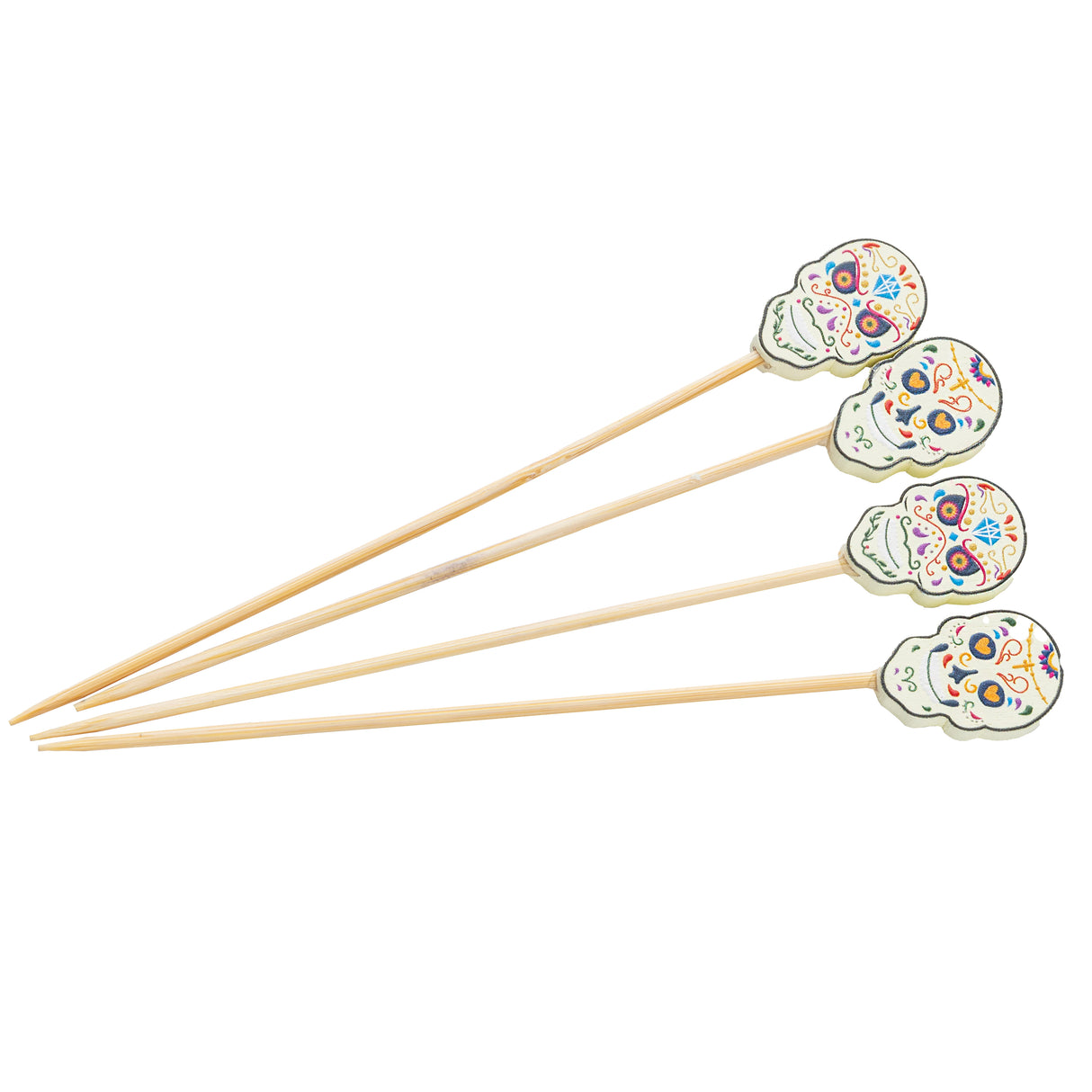 Four wooden bamboo picks with decorative sugar skulls at the top, each featuring colorful floral and swirl patterns inspired by Day of the Dead. Arranged in a fan shape, these festive decorative picks stand out against a plain white background.