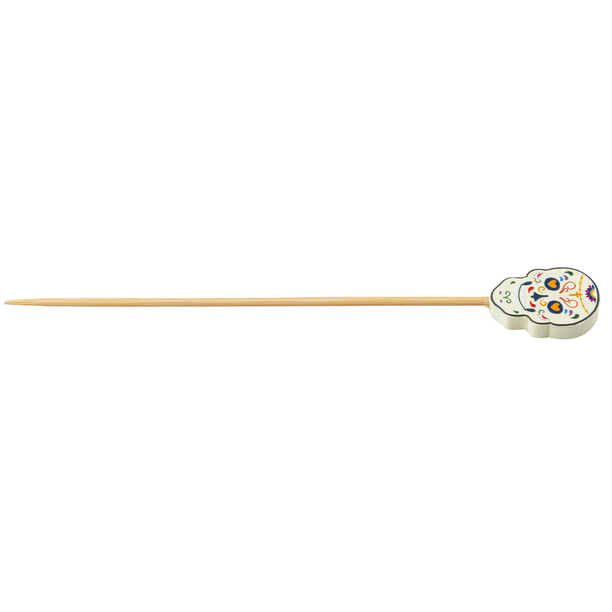 A bamboo pick with a decorative top shaped like a white Day of the Dead sugar skull, featuring colorful floral and swirl patterns. The decorative pick is light brown and pointed at one end.